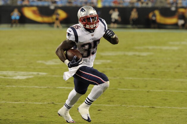 New England Patriots' Mike Gillislee (35) runs for a touchdown against the Carolina Panthers during the second half of a preseason NFL football game in Charlotte, N.C., Friday, Aug. 24, 2018. (AP Photo/Mike McCarn)