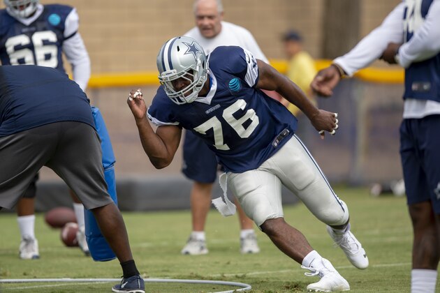 Dallas Cowboys defensive end Kony Ealy runs a drill during NFL football training camp, Saturday, July 28, 2018, in Oxnard, Calif. (AP Photo/Gus Ruelas)