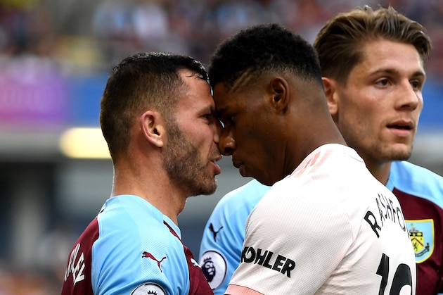 BURNLEY, ENGLAND - SEPTEMBER 02:  Marcus Rashford of Manchester United and Phil Bardsley of Burnley clash leading to a red card for Rashford during the Premier League match between Burnley FC and Manchester United at Turf Moor on September 2, 2018 in Burnley, United Kingdom.  (Photo by Shaun Botterill/Getty Images)