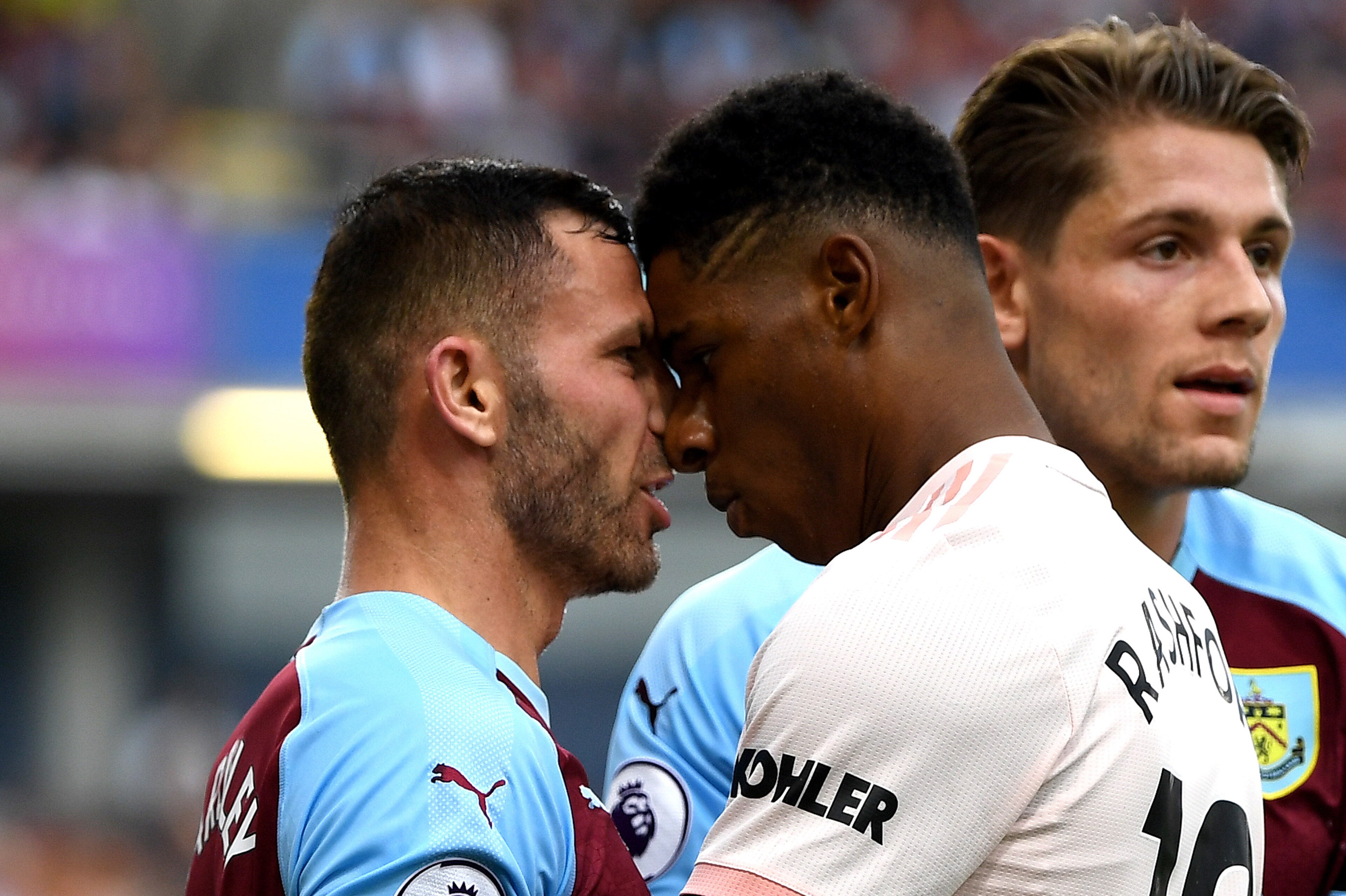 BURNLEY, ENGLAND - SEPTEMBER 02: Marcus Rashford of Manchester United and Phil Bardsley of Burnley clash leading to a red card for Rashford during the Premier League match between Burnley FC and Manchester United at Turf Moor on September 2, 2018 in Burnley, United Kingdom. (Photo by Shaun Botterill/Getty Images) BURNLEY, ENGLAND - SEPTEMBER 02: Marcus Rashford of Manchester United and Phil Bardsley of Burnley clash leading to a red card for Rashford during the Premier League match between Burnley FC and Manchester United at Turf Moor on September 2, 2018 in Burnley, United Kingdom. (Photo by Shaun Botterill/Getty Images)