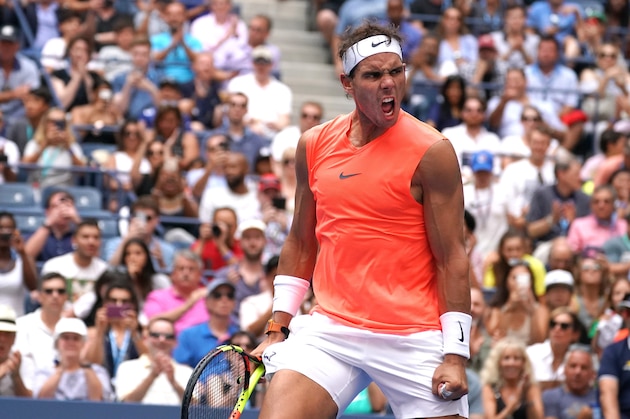 Rafael Nadal of Spain celebrates his match point against Nikoloz Basilashvili of Georgia on Day 7 of the 2018 US Open Men's Singles match at the USTA Billie Jean King National Tennis Center in New York on September 2, 2018. (Photo by TIMOTHY A. CLARY / AFP)        (Photo credit should read TIMOTHY A. CLARY/AFP/Getty Images)