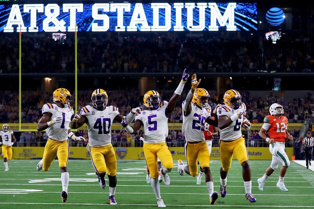ARLINGTON, TX - SEPTEMBER 02:  Jacob Phillips #6 of the LSU Tigers returns an interception to score a touchdown against the Miami Hurricanes in the second quarter of The AdvoCare Classic at AT&T Stadium on September 2, 2018 in Arlington, Texas.  (Photo by Tom Pennington/Getty Images)