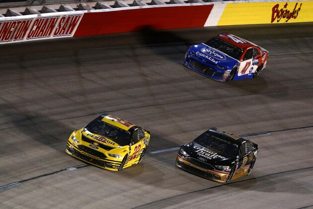 DARLINGTON, SC - SEPTEMBER 02:  Joey Logano, driver of the #22 Pennzoil Ford, leads Brad Keselowski, driver of the #2 Miller Genuine Draft Ford, during the Monster Energy NASCAR Cup Series Bojangles' Southern 500 at Darlington Raceway on September 2, 2018 in Darlington, South Carolina.  (Photo by Sarah Crabill/Getty Images)
