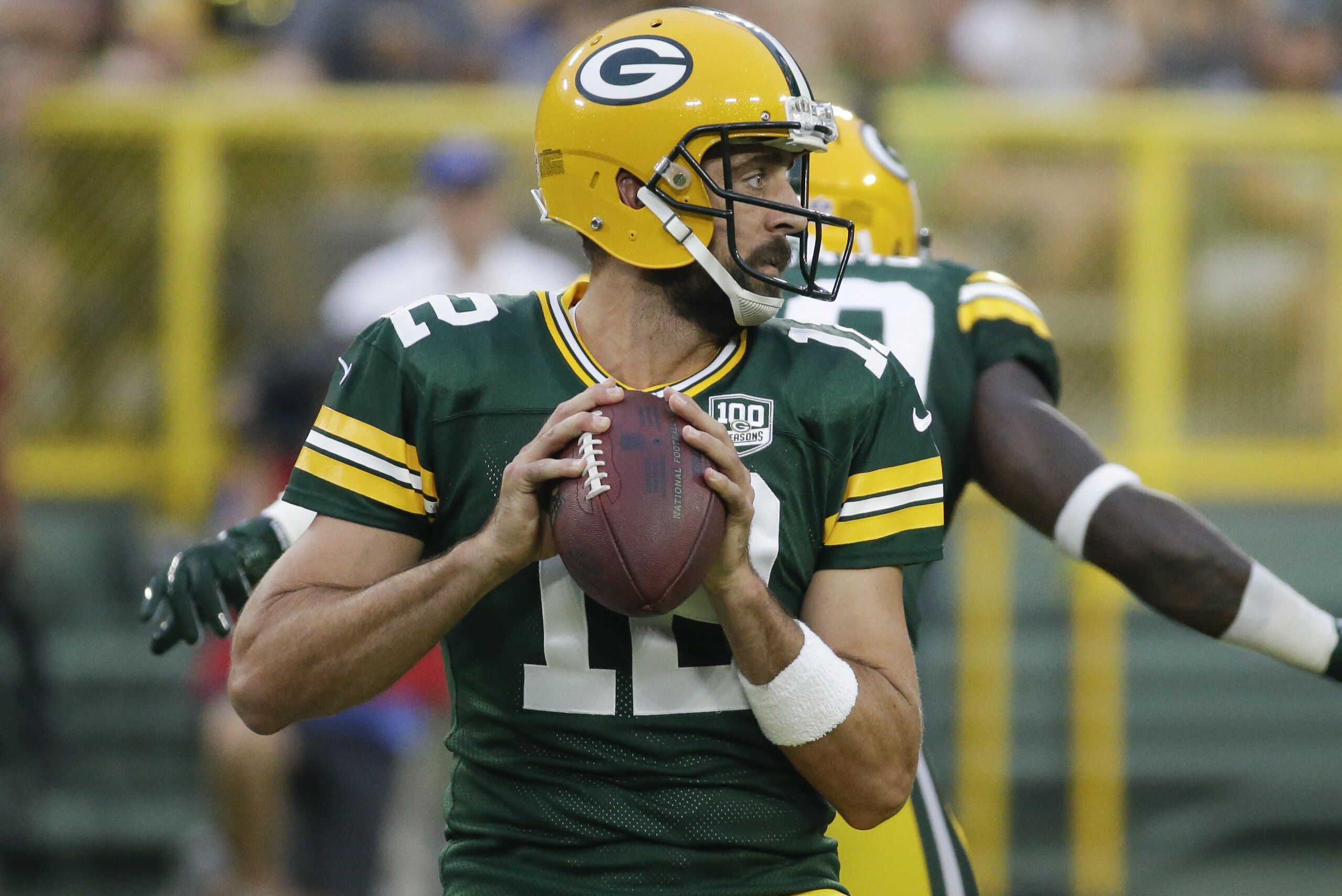 Green Bay Packers' Aaron Rodgers throws during the first half of a preseason NFL football game against the Pittsburgh Steelers Thursday, Aug. 16, 2018, in Green Bay, Wis. (AP Photo/Mike Roemer)