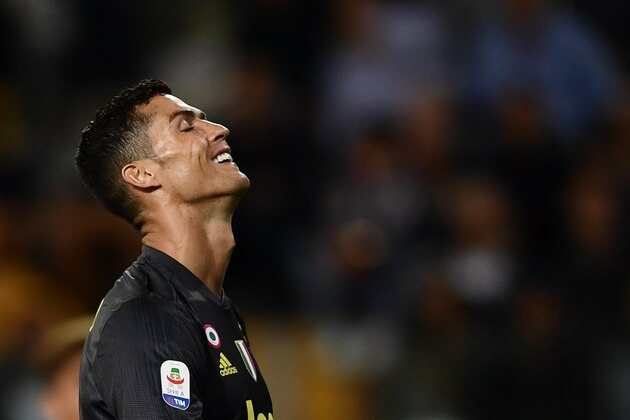 Juventus' Portuguese forward Cristiano Ronaldo reacts during the Italian Serie A football match Parma vs Juventus on September 1, 2018 at Ennio Tardini stadium in Parma. (Photo by Marco BERTORELLO / AFP)        (Photo credit should read MARCO BERTORELLO/AFP/Getty Images)