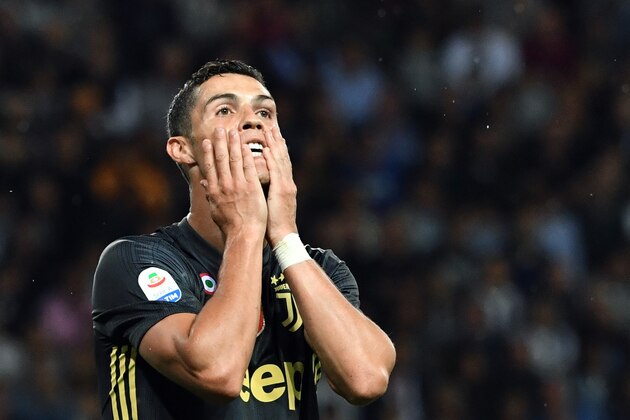 Juventus' Portuguese forward Cristiano Ronaldo reacts after missing a goal opportunity during the Italian Serie A football match Parma vs Juventus on September 1, 2018 at Ennio Tardini stadium in Parma. (Photo by Andreas SOLARO / AFP)        (Photo credit should read ANDREAS SOLARO/AFP/Getty Images)