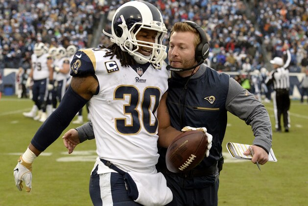 Los Angeles Rams running back Todd Gurley (30) is congratulated by head coach Sean McVay after Gurley scored a touchdown against the Tennessee Titans on an 80-yard pass reception in the first half of an NFL football game Sunday, Dec. 24, 2017, in Nashville, Tenn. (AP Photo/Mark Zaleski)