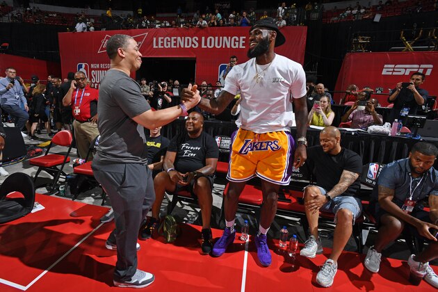 LAS VEGAS, NV - JULY 15: Tyronn Lue of the Cleveland Cavaliers and LeBron James of the Los Angeles Lakers greet each other during the 2018 Las Vegas Summer League on July 15, 2018 at the Thomas & Mack Center in Las Vegas, Nevada. NOTE TO USER: User expressly acknowledges and agrees that, by downloading and/or using this photograph, user is consenting to the terms and conditions of the Getty Images License Agreement. Mandatory Copyright Notice: Copyright 2018 NBAE (Photo by Garrett Ellwood/NBAE via Getty Images)