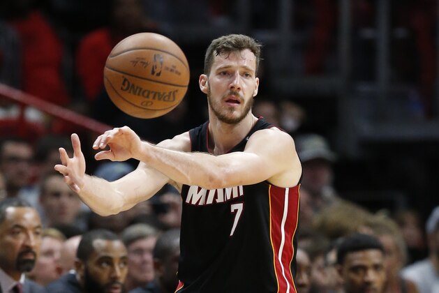 Miami Heat guard Goran Dragic passes the ball during the second half of an NBA basketball game against the Brooklyn Nets, Saturday, March 31, 2018, in Miami. The Nets defeated the Heat 110-109 in overtime. (AP Photo/Wilfredo Lee)