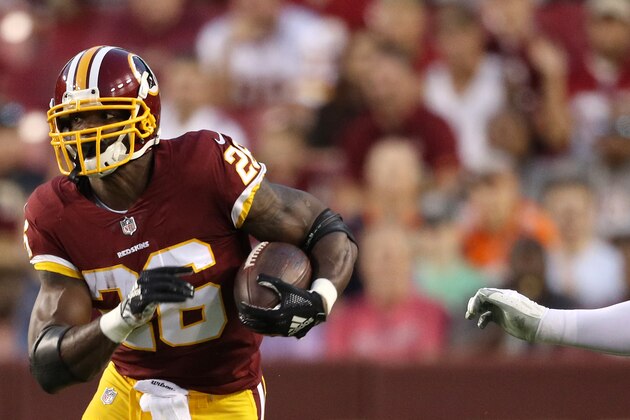 LANDOVER, MD - AUGUST 24: Running back Adrian Peterson #26 of the Washington Redskins rushes against the Denver Broncos in the first quarter during a preseason game at FedExField on August 24, 2018 in Landover, Maryland. (Photo by Patrick Smith/Getty Images)