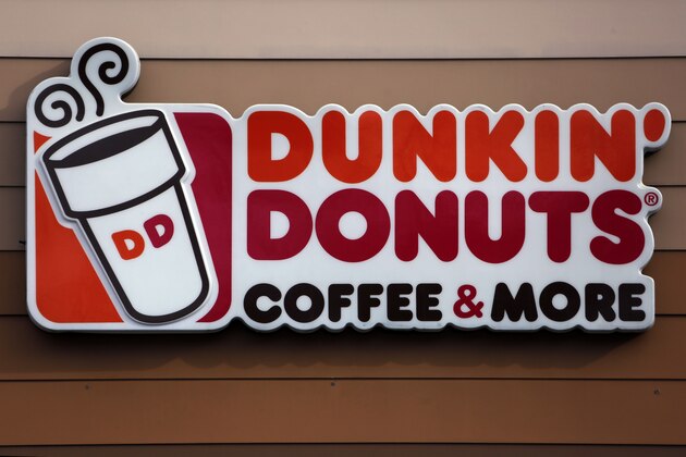 This is the Dunkin' Donuts log on a shop in Mount Lebanon, Pa. Monday, Jan. 22, 2018. (AP Photo/Gene J. Puskar)
