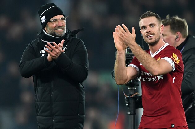 LIVERPOOL, ENGLAND - MARCH 03:  Jordan Henderson of Liverpool celebrates with Jurgen Klopp, Manager of Liverpool following the Premier League match between Liverpool and Newcastle United at Anfield on March 3, 2018 in Liverpool, England.  (Photo by Gareth Copley/Getty Images)