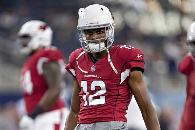 ARLINGTON, TX - AUGUST 26:  Brice Butler #12 of the Arizona Cardinals warms up before a game against the Dallas Cowboys at AT&T Stadium during week 3 of the preseason on August 26, 2018 in Arlington, Texas.  The Cardinals defeated the Cowboys 27-3.  (Photo by Wesley Hitt/Getty Images)