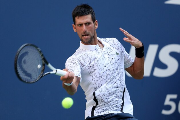 NEW YORK, NY - SEPTEMBER 03:  Novak Djokovic of Serbia returns the ball during the men's singles fourth round match against Jaoa Sousa of Portugal on Day Eight of the 2018 US Open at the USTA Billie Jean King National Tennis Center on September 3, 2018 in the Flushing neighborhood of the Queens borough of New York City.  (Photo by Matthew Stockman/Getty Images)