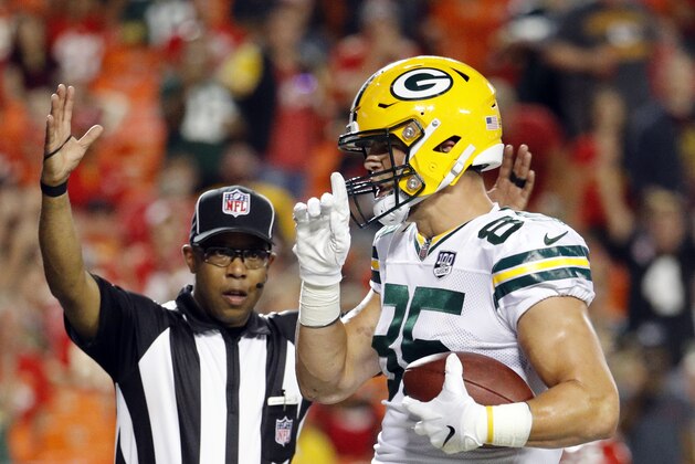 Green Bay Packers tight end Robert Tonyan (85) celebrates his touchdown during the first half of an NFL preseason football game against the Kansas City Chiefs in Kansas City, Mo., Thursday, Aug. 30, 2018. (AP Photo/Charlie Riedel)