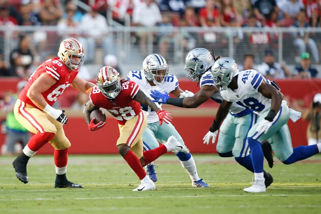 SANTA CLARA, CA - AUGUST 9: Jerick McKinnon #28 of the San Francisco 49ers rushes during the game against the Dallas Cowboys at Levi Stadium on August 9, 2018 in Santa Clara, California. The 49ers defeated the Cowboys 24-21. (Photo by Michael Zagaris/San Francisco 49ers/Getty Images)