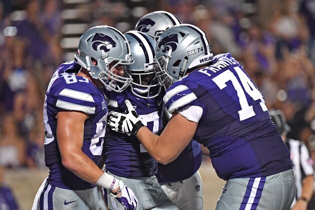 MANHATTAN, KS - SEPTEMBER 01: Wide receiver Isaiah Zuber #7 of the Kansas State Wildcats celebrates with his teammates after catching a touchdown pass during the second half against the South Dakota Coyotes on September 1, 2018 at Bill Snyder Family Stadium in Manhattan, Kansas.  (Photo by Peter G. Aiken/Getty Images)