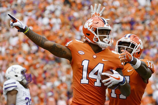 CLEMSON, SC - SEPTEMBER 01: Wide receiver Diondre Overton #14 of the Clemson Tigers celebrates with wide receiver Cornell Powell #17 after catching a touchdown pass against the Furman Paladins during the second quarter of the football game at Clemson Memorial Stadium on September 1, 2018 in Clemson, South Carolina. (Photo by Mike Comer/Getty Images)