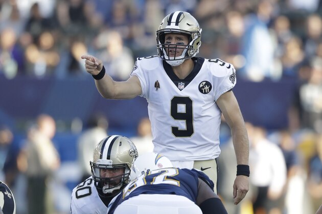 New Orleans Saints quarterback Drew Brees motions during the first half of an NFL preseason football game against the Los Angeles Chargers Saturday, Aug. 25, 2018, in Carson, Calif. (AP Photo/Marcio Jose Sanchez)