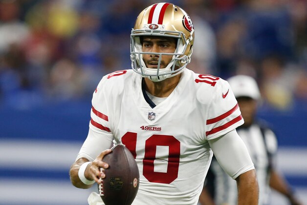 INDIANAPOLIS, IN - AUGUST 25: Jimmy Garoppolo #10 of the San Francisco 49ers looks for an open receiver during the game against the Indianapolis Colts at Lucas Oil Stadium on August 25, 2018 in Indianapolis, Indiana. The Colts defeated the 49ers 23-17. (Photo by Michael Zagaris/San Francisco 49ers/Getty Images)