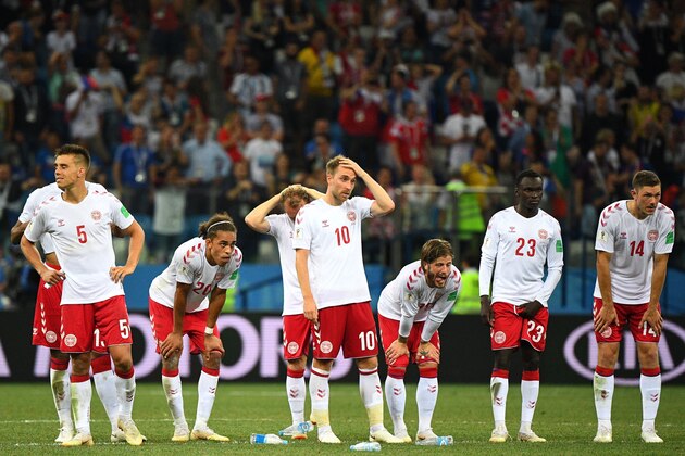 TOPSHOT - From left : Denmark's defender Jonas Knudsen, Denmark's forward Yussuf Poulsen, Denmark's midfielder Christian Eriksen, Denmark's midfielder Lasse Schone, Denmark's forward Pione Sisto and Denmark's defender Henrik Dalsgaard look dejected after being defeated in the penalty shoot-out at the end of the Russia 2018 World Cup round of 16 football match between Croatia and Denmark at the Nizhny Novgorod Stadium in Nizhny Novgorod on July 1, 2018. (Photo by Johannes EISELE / AFP) / RESTRICTED TO EDITORIAL USE - NO MOBILE PUSH ALERTS/DOWNLOADS        (Photo credit should read JOHANNES EISELE/AFP/Getty Images)