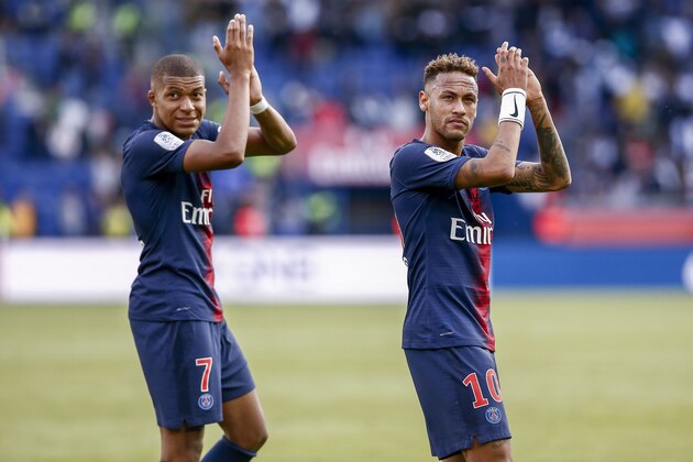 PARIS, FRANCE - AUGUST 25: Neymar Jr #10 and Kylian Mbappe #7 of Paris Saint-Germain cheer the fans for their support after the Ligue 1 Conforama game between Paris Saint-Germain and Angers SCO at Parc des Princes on August 25, 2018 in Paris, France. (Photo by Catherine Steenkeste/Getty Images)