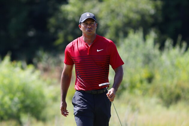 NORTON, MA - SEPTEMBER 03:  Tiger Woods of the United States reacts on the second green during the final round of the Dell Technologies Championship at TPC Boston on September 3, 2018 in Norton, Massachusetts.  (Photo by Tim Bradbury/Getty Images)