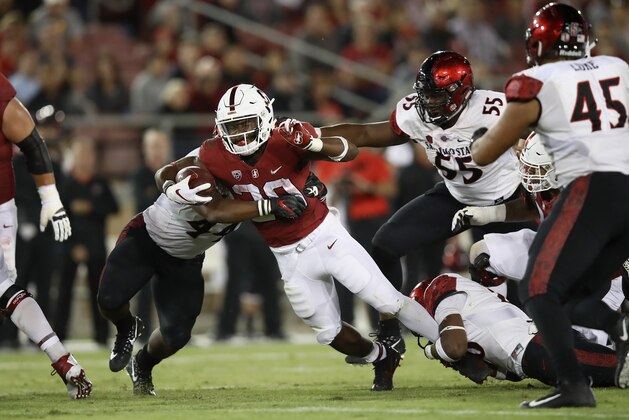 PALO ALTO, CA - AUGUST 31:  Bryce Love #20 of the Stanford Cardinal runs the ball against the San Diego State Aztecs at Stanford Stadium on August 31, 2018 in Palo Alto, California.  (Photo by Ezra Shaw/Getty Images)