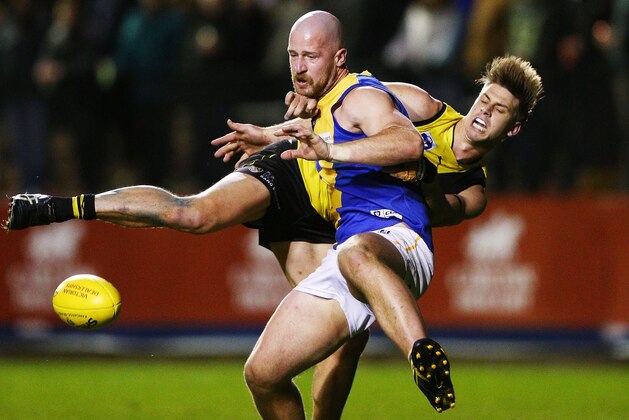MELBOURNE, AUSTRALIA - SEPTEMBER 01:  Hugh Beasley of the Tigers competes for the ball behind ahead of Nick Rodda of Williamstown during the VFL Qualifying Final match between Richmond and Williamstown at Stannards Stadium on September 1, 2018 in Melbourne, Australia.  (Photo by Michael Dodge/AFL Media/Getty Images)
