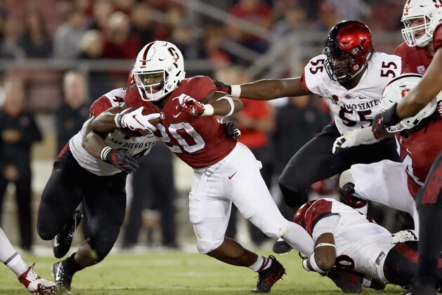PALO ALTO, CA - AUGUST 31:  Bryce Love #20 of the Stanford Cardinal runs the ball against the San Diego State Aztecs at Stanford Stadium on August 31, 2018 in Palo Alto, California.  (Photo by Ezra Shaw/Getty Images)