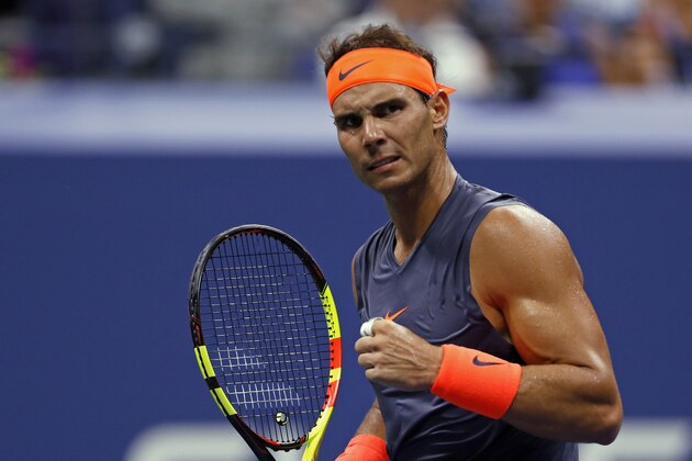 Rafael Nadal, of Spain, reacts during a match against Dominic Thiem, of Austria, during the quarterfinals of the U.S. Open tennis tournament Tuesday, Sept. 4, 2018, in New York. (AP Photo/Adam Hunger)
