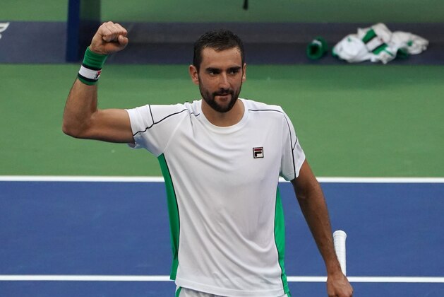 Marin Cilic of Croatia celebrates his victory over David Goffin of Belgium during their 2018 US Open men's round 4 tennis match on September 3, 2018 in New York. (Photo by kena betancur / AFP)        (Photo credit should read KENA BETANCUR/AFP/Getty Images)