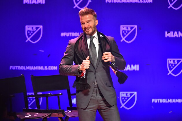 MIAMI, FL - JANUARY 29: David Beckham after being presented with a scarf by Don Garber, MLS Commissioner after officially awarding the City of Miami an MLS franchise at The Knight Concert Hall on January 29, 2018 in Miami, Florida. (Photo by Eric Espada/Getty Images)