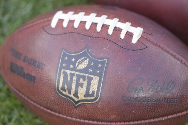Game balls rest on the field before an NFL football preseason game between the Cleveland Browns and the Buffalo Bills, Friday, Aug. 17, 2018, in Cleveland. Buffalo won 19-17. (AP Photo/David Richard)