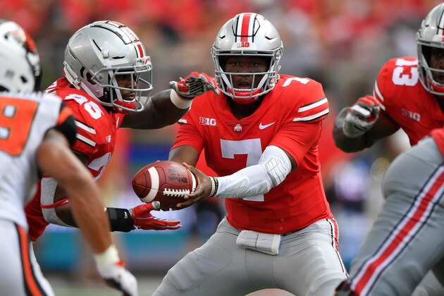 COLUMBUS, OH - SEPTEMBER 1:  Quarterback Dwayne Haskins #7 of the Ohio State Buckeyes hands off the ball against the Oregon State Beavers at Ohio Stadium on September 1, 2018 in Columbus, Ohio. Ohio State defeated Oregon State 77-31.  (Photo by Jamie Sabau/Getty Images)