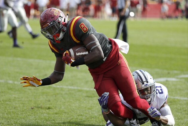 AMES, IA – OCTOBER 29: Wide receiver Deshaunte Jones #8 of the Iowa State Cyclones drives the ball in for a touchdown past defensive back Kendall Adams #21 of the Kansas State Wildcats in the second half of play at Jack Trice Stadium on October 29, 2016 in Ames, Iowa. The Kansas State Wildcats won 31-26 over the Iowa State Cyclones. (Photo by David K Purdy/Getty Images)