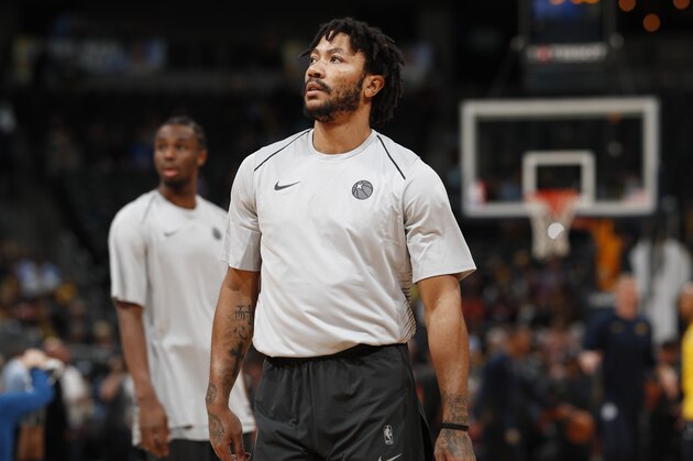 Minnesota Timberwolves guard Derrick Rose (25) in the first half of an NBA basketball game Thursday, April 5, 2018, in Denver. (AP Photo/David Zalubowski)