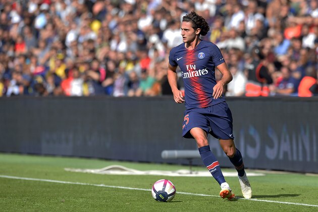PARIS, FRANCE - AUGUST 25:  Adrien Rabiot of Paris Saint-Germain runs with the ball during the Ligue 1 match between Paris Saint-Germain and Angers SCO at Parc des Princes on August 25, 2018 in Paris, France.  (Photo by Aurelien Meunier/Getty Images)