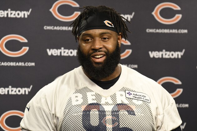 Chicago Bears defensive end Akiem Hicks (96) talks to the media before practice at the NFL football team's workout Tuesday, June 5, 2018, in Lake Forest, Ill. (AP Photo/David Banks)