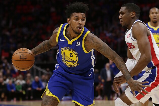 Golden State Warriors guard Nick Young (6) drives against Detroit Pistons guard Langston Galloway (9) during the second quarter of an NBA basketball game Friday, Dec. 8, 2017, in Detroit. (AP Photo/Duane Burleson)