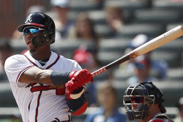 Atlanta Braves left fielder Ronald Acuna Jr. (13) bats against the Boston Red Sox during baseball game Monday, Sept. 3, 2018, in Atlanta. Boston won 8-2. (AP Photo/John Bazemore)