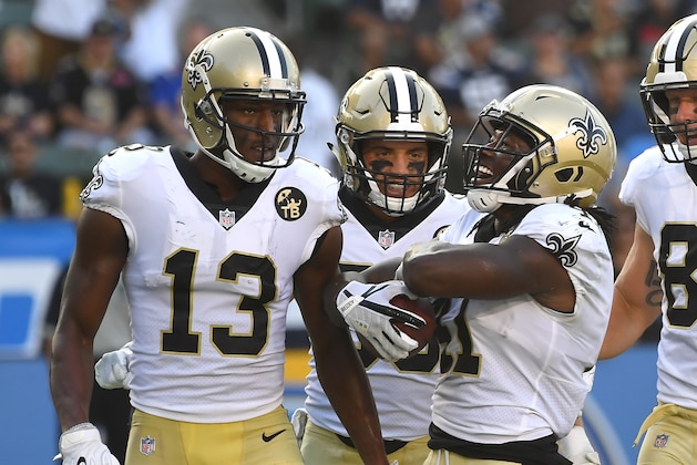 CARSON, CA - AUGUST 25: Austin Carr #80 and Michael Thomas #13 celebrate after a touchdown by Alvin Kamara #41 of the New Orleans Saints in the second quarter of the pre-season game against the Los Angeles Chargers at StubHub Center on August 25, 2018 in Carson, California.  (Photo by Jayne Kamin-Oncea/Getty Images)