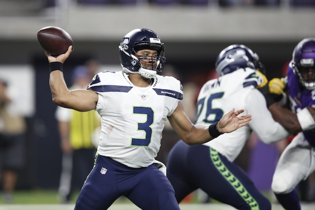 MINNEAPOLIS, MN - AUGUST 24: Russell Wilson #3 of the Seattle Seahawks looks to pass the ball during a preseason game against the Minnesota Vikings at U.S. Bank Stadium on August 24, 2018 in Minneapolis, Minnesota. (Photo by Joe Robbins/Getty Images)
