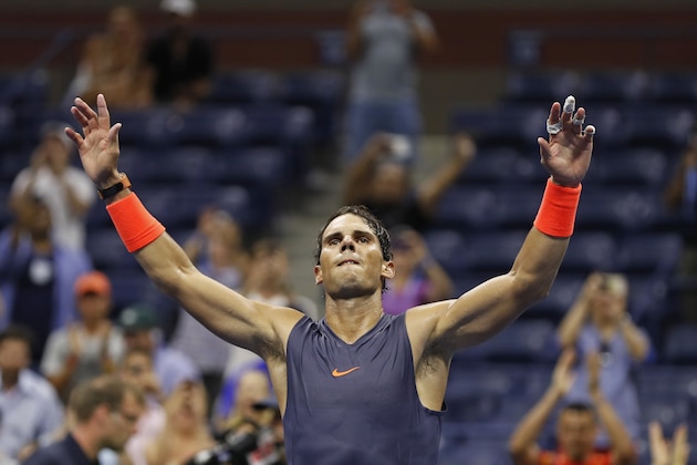 Rafael Nadal, of Spain, celebrates after defeating Dominic Thiem, of Austria, during the quarterfinals of the U.S. Open tennis tournament, early on Wednesday, Sept. 5, 2018, in New York. (AP Photo/Adam Hunger)