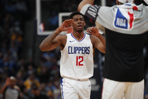 Los Angeles Clippers guard Tyrone Wallace (12) in the second half of an NBA basketball game Tuesday, Feb. 27, 2018, in Denver. The Clippers prevailed 122-120. (AP Photo/David Zalubowski)