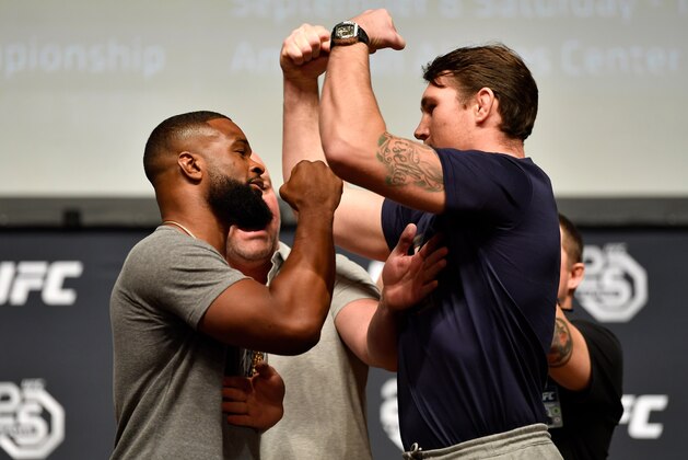 LOS ANGELES, CA - AUGUST 03:  (L-R) Opponents Tyron Woodley and Darren Till face off during the UFC press conference inside the Orpheum Theater on August 3, 2018 in Los Angeles, California. (Photo by Jeff Bottari/Zuffa LLC/Zuffa LLC via Getty Images)
