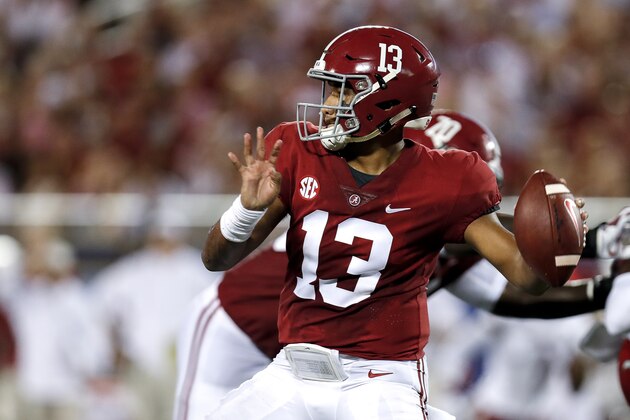 ORLANDO, FL - SEPTEMBER 1: Quarterback Tua Tagovailoa #13 of the Alabama Crimson Tide throws a pass during the game against the Louisville Cardinals during the Camping World Kickoff at Camping World Stadium on September 1, 2018 in Orlando, Florida. #1 ranked Alabama defeated Louisville 51 to 14. (Photo by Don Juan Moore/Getty Images)
