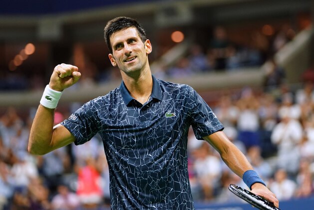 Serbia's Novak Djokovic celebrates a point against Australia's John Millman during their Men's Singles Quarter-Finals match at the 2018 US Open at the USTA Billie Jean King National Tennis Center in New York on September 5, 2018. (Photo by Don EMMERT / AFP)        (Photo credit should read DON EMMERT/AFP/Getty Images)