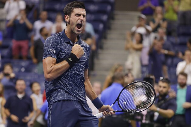 Novak Djokovic, of Serbia, celebrates after defeating John Millman, of Australia, 6-3, 6-4, 6-4 in the quarterfinals of the U.S. Open tennis tournament, Wednesday, Sept. 5, 2018, in New York. (AP Photo/Frank Franklin II)