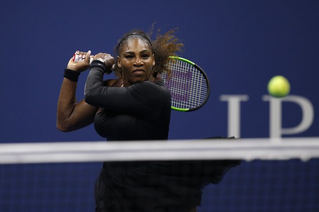 Serena Williams, of the United States, returns a shot to Karolina Pliskova, of the Czech Republic, during the quarterfinals of the U.S. Open tennis tournament, Tuesday, Sept. 4, 2018, in New York. (AP Photo/Jason DeCrow)